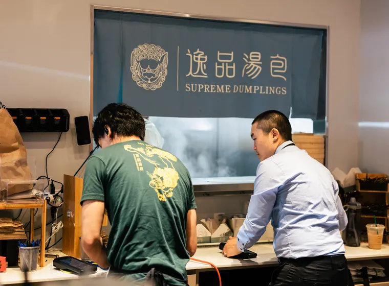Supreme Dumplings team preparing the Kirkland restaurant for service