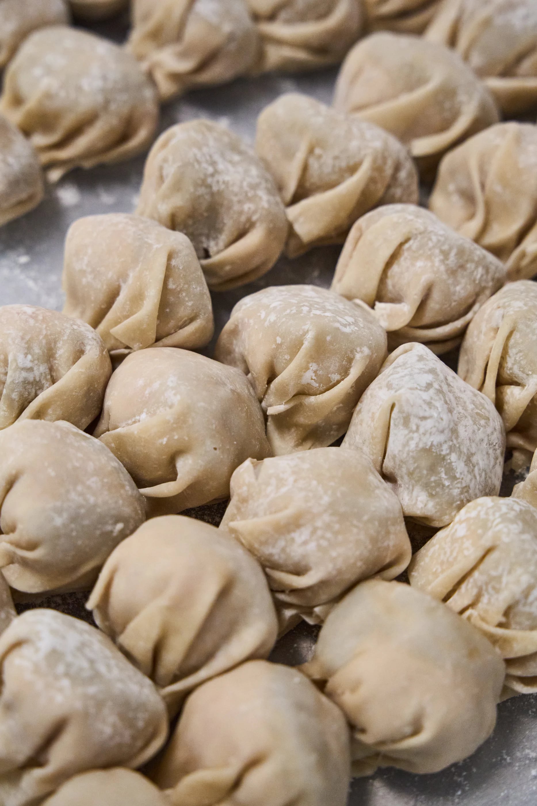 Hand-folded wontons ready for the kitchen