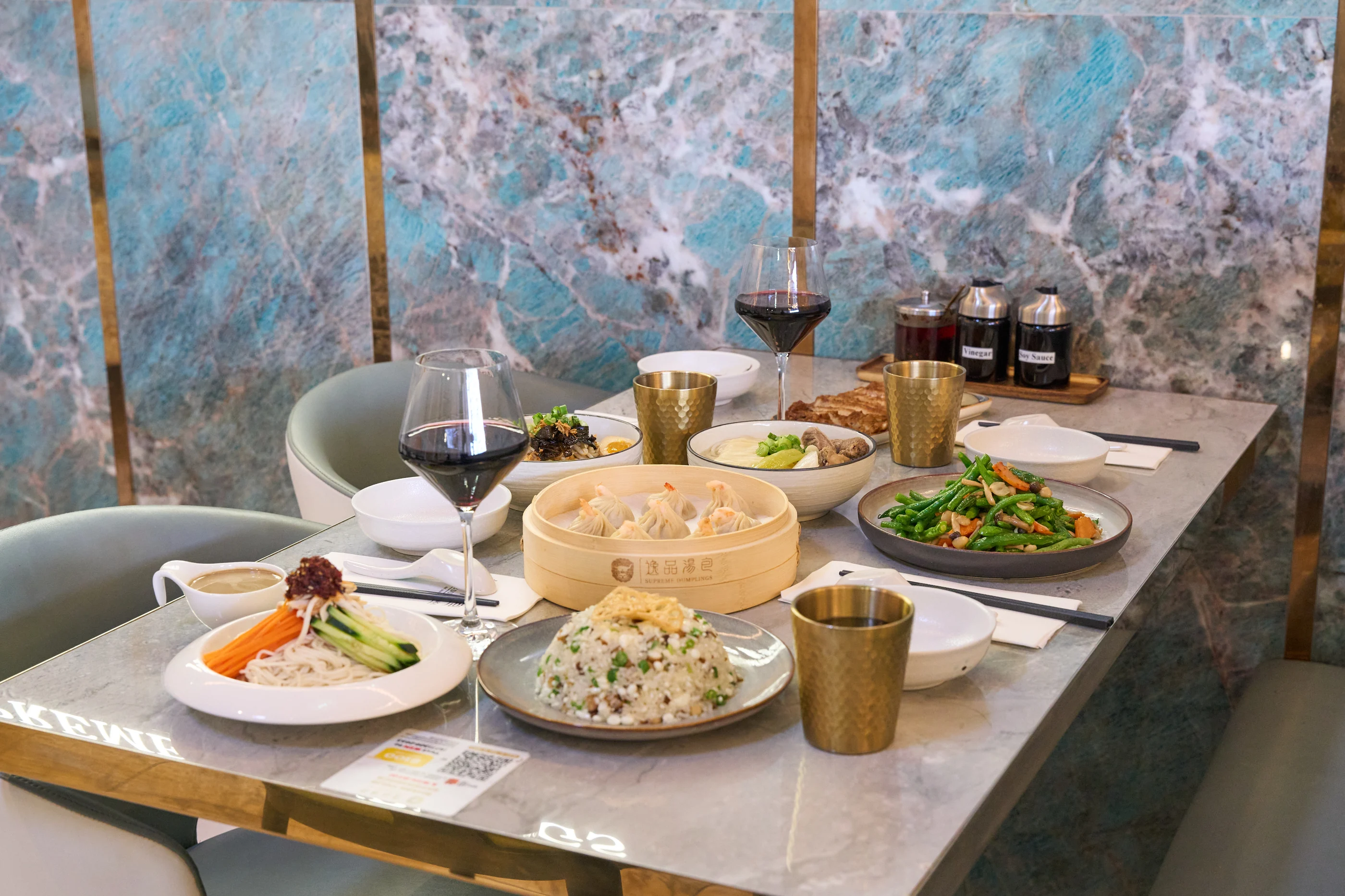 A full Supreme Dumplings table set for sharing