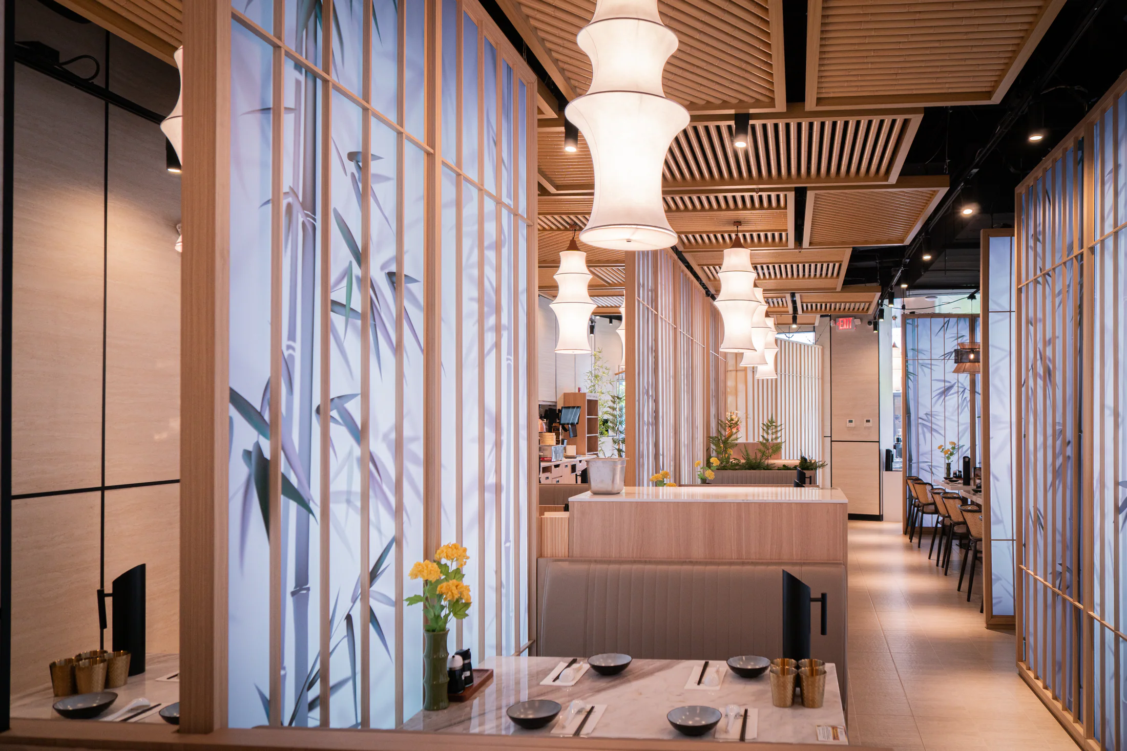 The softly lit dining room at Supreme Dumplings Redmond Town Center