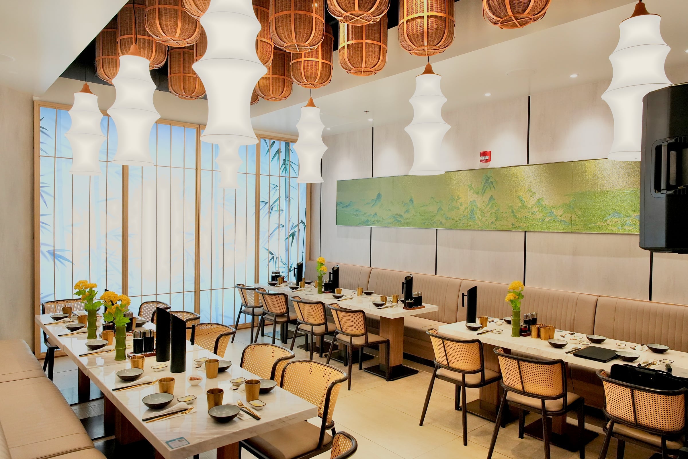 A private dining room set for a gathering at Supreme Dumplings